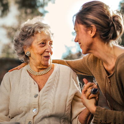 Adult daughter embracing her mother